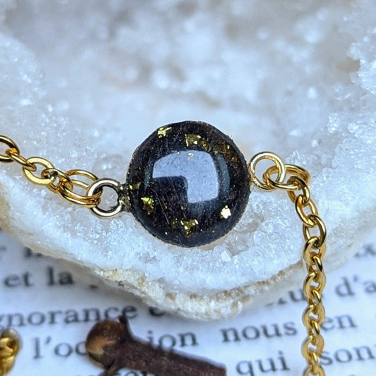 bracelet rond noir et doré paillettes élégantes
